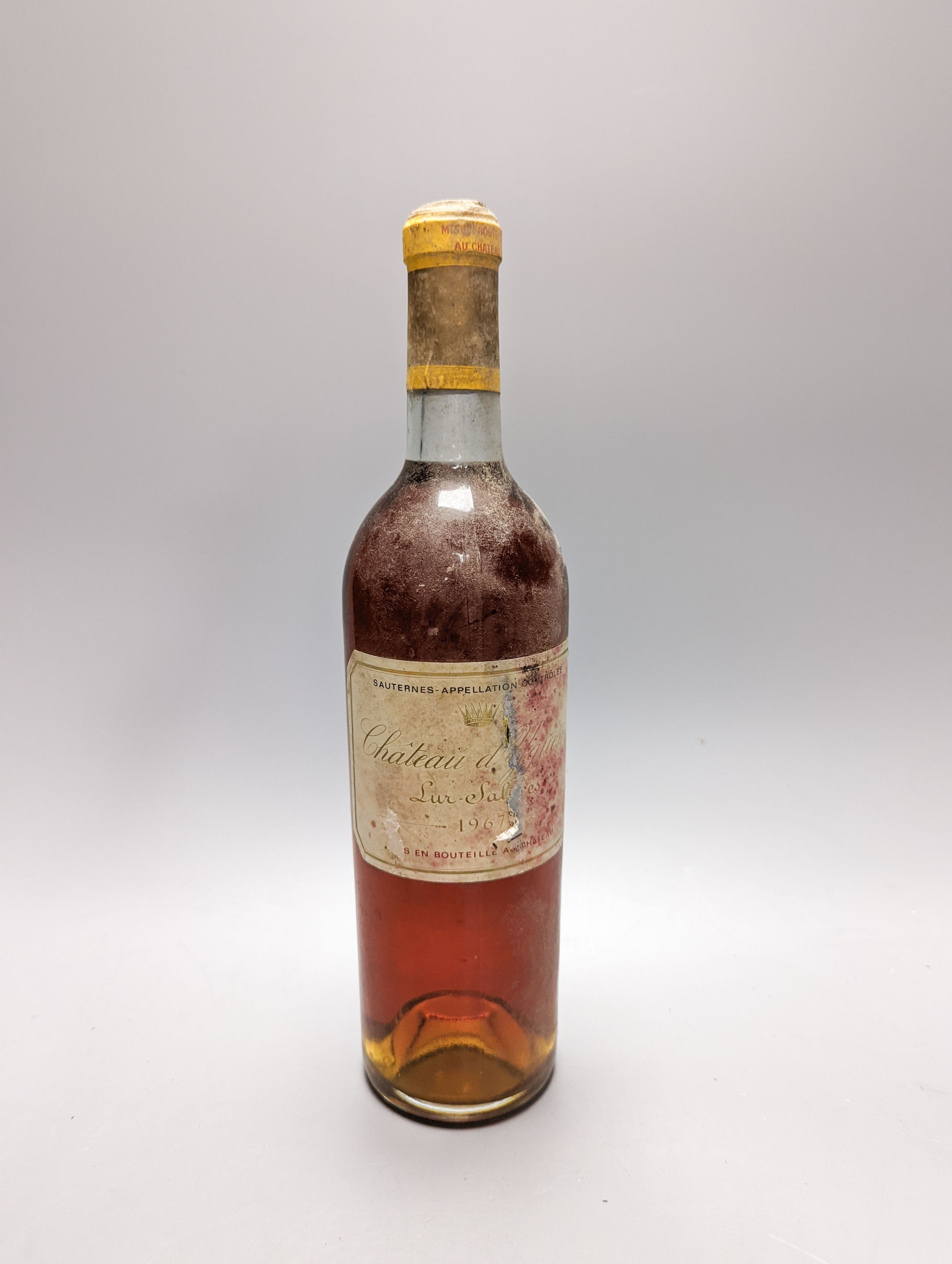 Two bottles of Chateau D'Yquem Sauternes 1967-1965, and a 375ml bottle